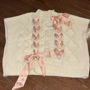 Elegant White Sweater with Pink Accents